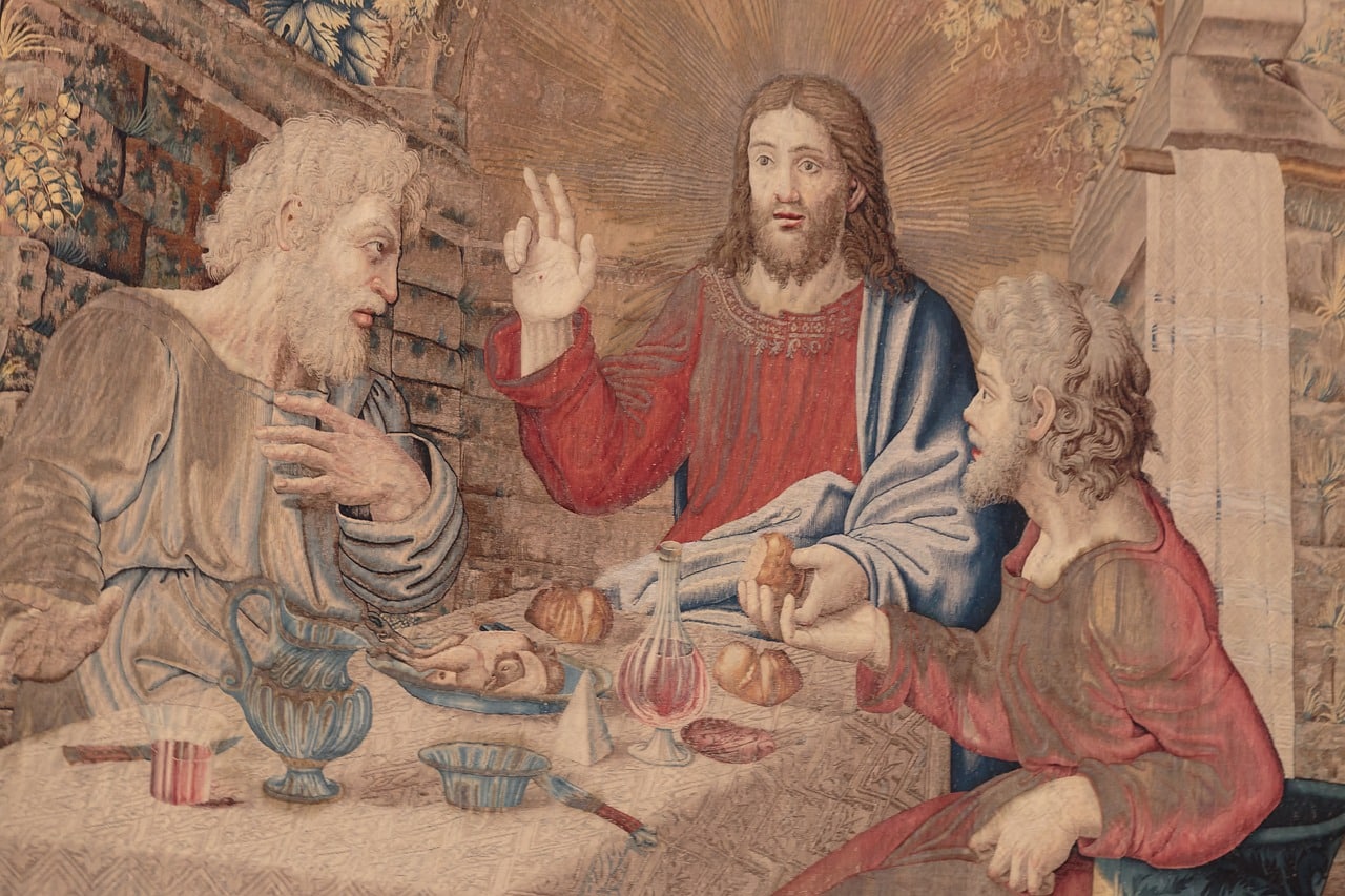 Jesucristo cenando con dos seguidores