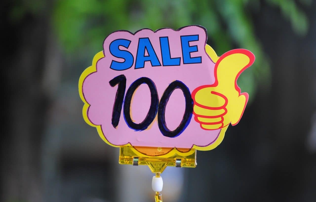 Cartel de rebaja "SALE 100"